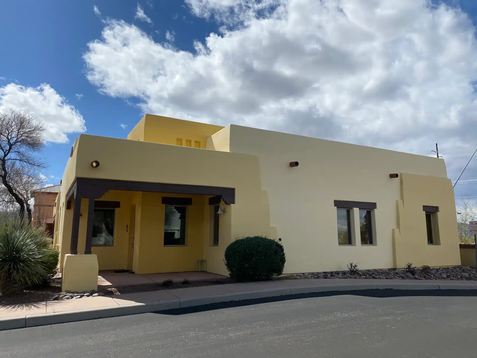 Freshly painted adobe-style commercial building exterior in Tucson