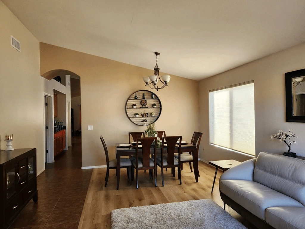 Bright living and dining room with freshly painted warm beige walls