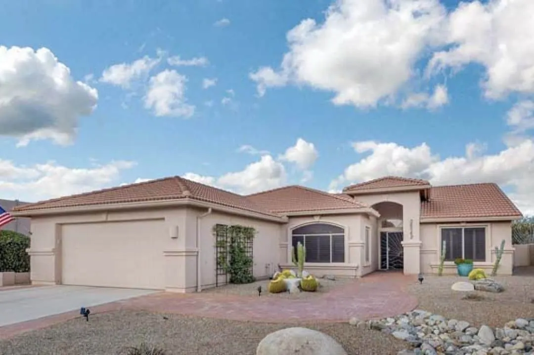 Single-story Tucson stucco home with a fresh exterior paint job