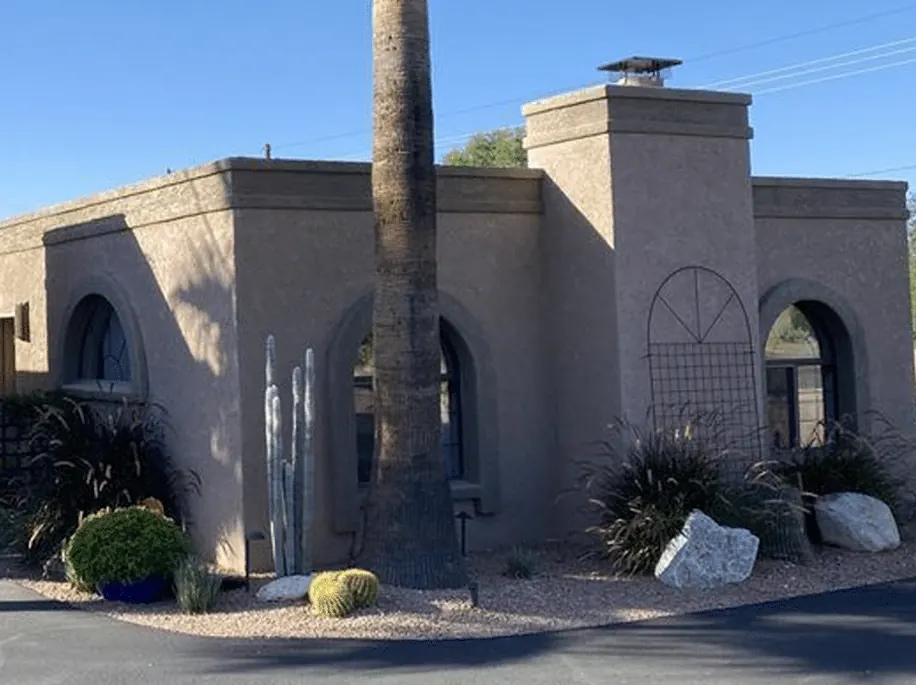 Arched stucco home exterior in Tucson after a repaint
